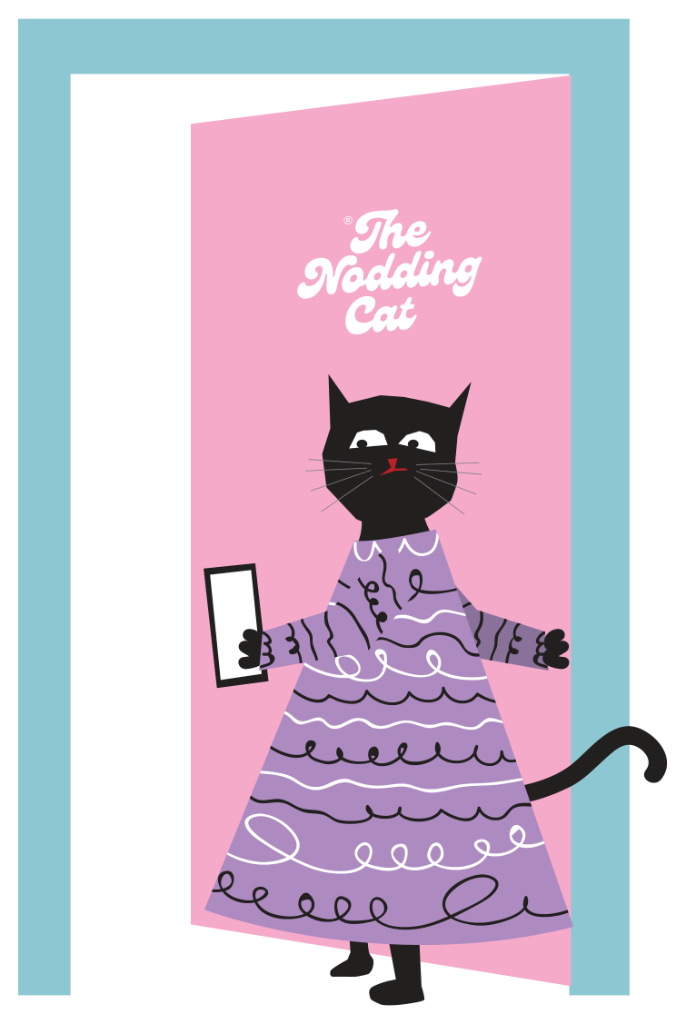Cat welcoming you at The Nodding Cat door