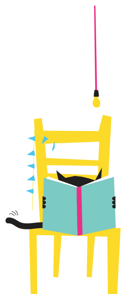 Cat reading a book on a chair